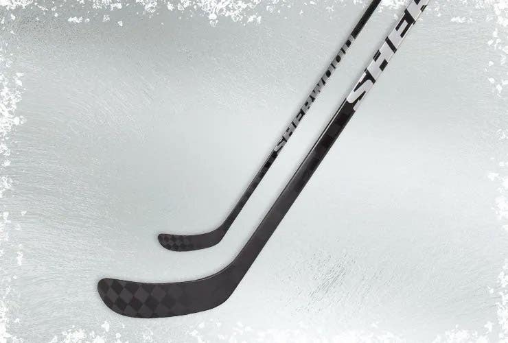 Sherwood Mystery hockey stick on an icy background