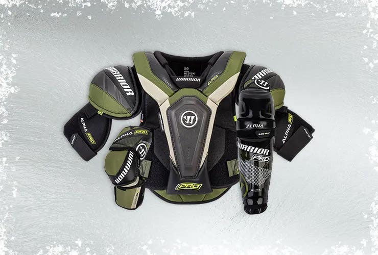 Warrior Alpha Pro hockey protective on an icy background